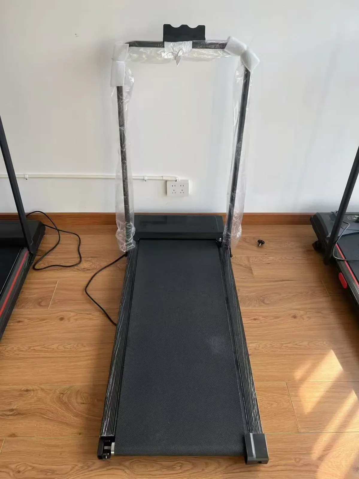 A 8-speed walking pad/treadmill with Foldable handlebars - Image 2